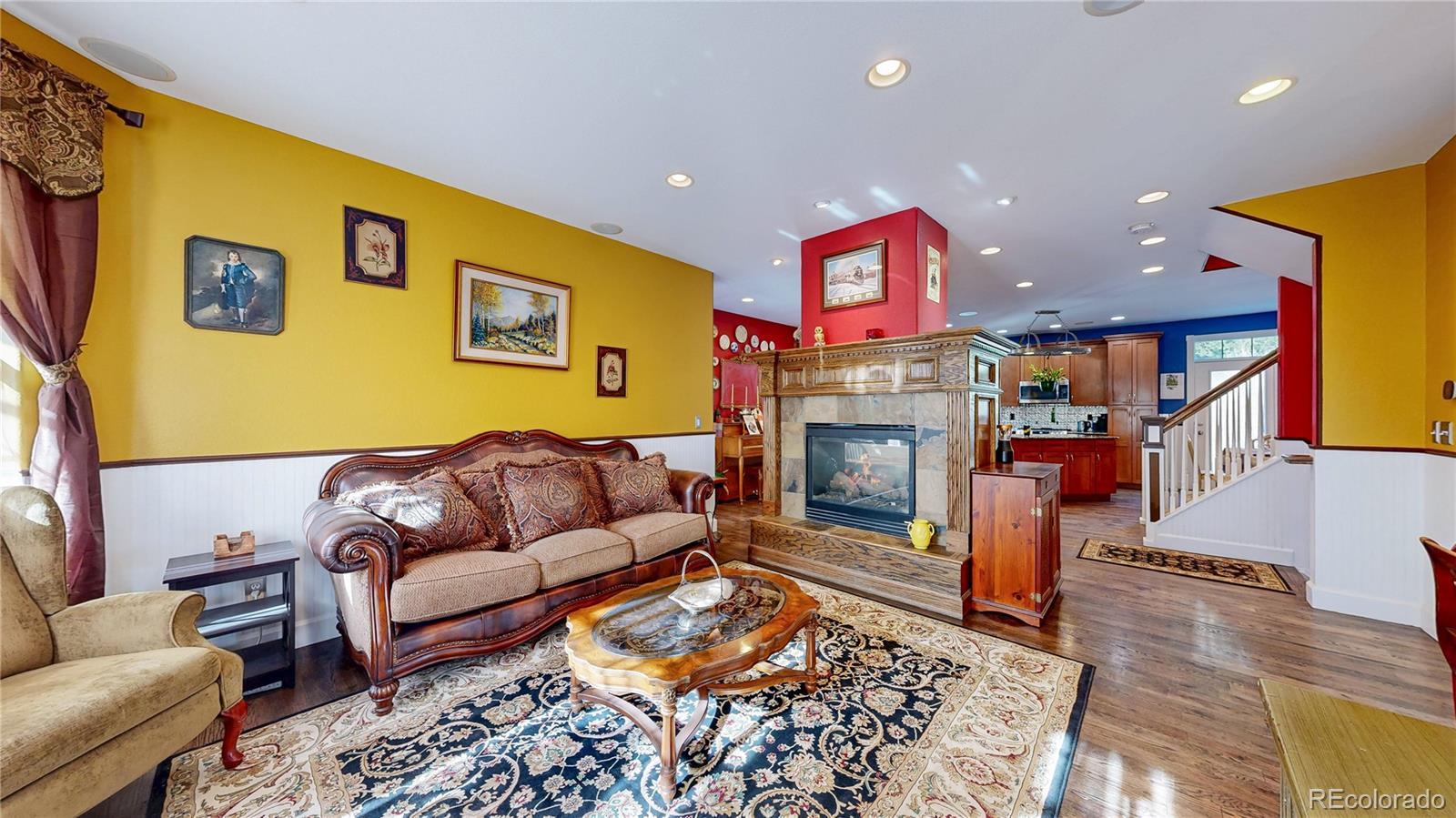 1431 Marion Street Georgetown, CO 80444 - Photo 44 of 50 a living room with fireplace furniture and a rug