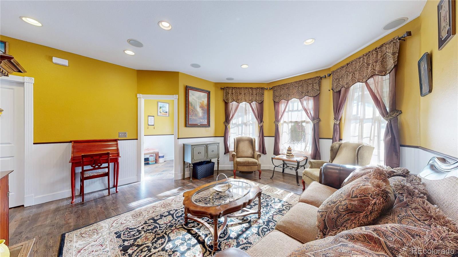 1431 Marion Street Georgetown, CO 80444 - Photo 45 of 50 a living room with furniture and a fireplace