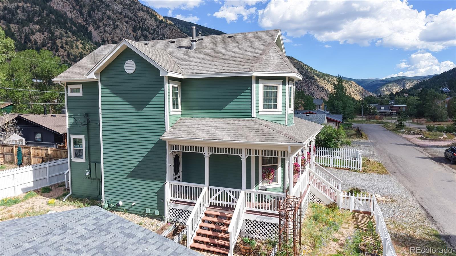 1431 Marion Street Georgetown, CO 80444 - Photo 7 of 50 a view of a house with a yard and sitting area