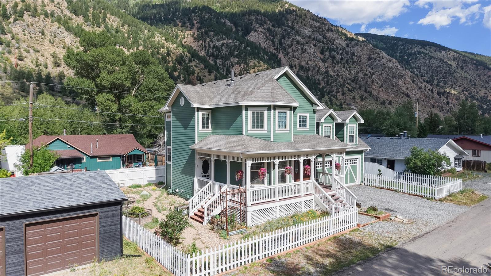 1431 Marion Street Georgetown, CO 80444 - Photo 8 of 50 a front view of a house with garden