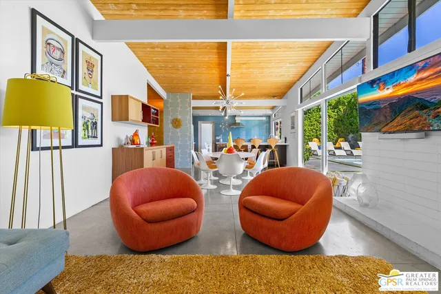 a outdoor living space with furniture and a potted plant