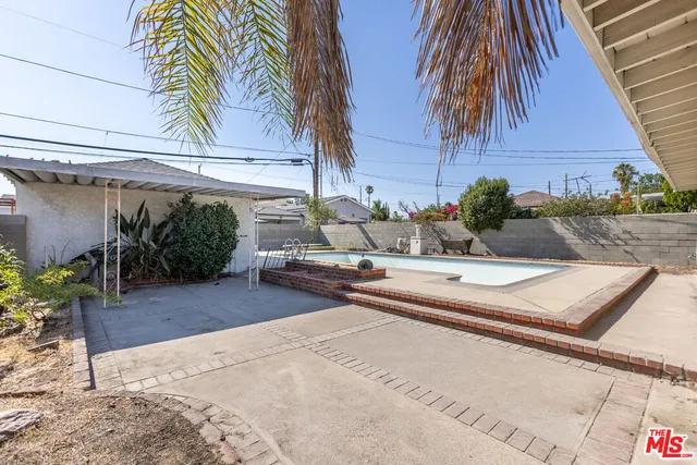 a view of a house with a swimming pool