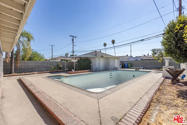 a house with trees in the background