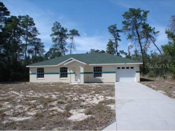 2463 Southwest 168th Loop Ocala, FL 34473 - Photo 1 of 1 front view of a house with a yard