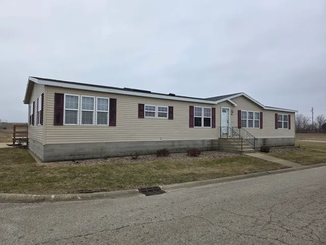 a house view with a backyard space