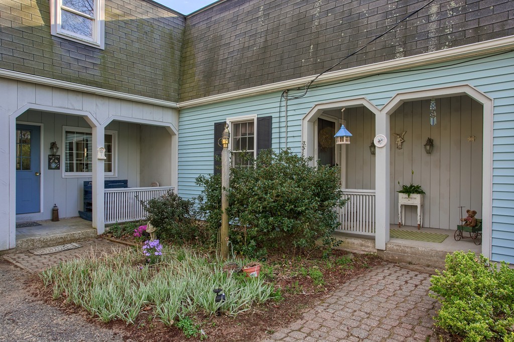 318 Patriots Road Templeton, MA 01468 - Photo 2 of 30 a front view of a house with garden