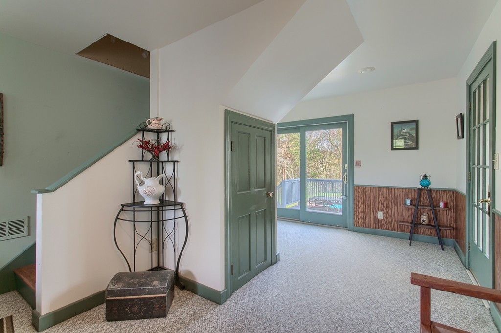 318 Patriots Road Templeton, MA 01468 - Photo 30 of 30 a living room with furniture and a window