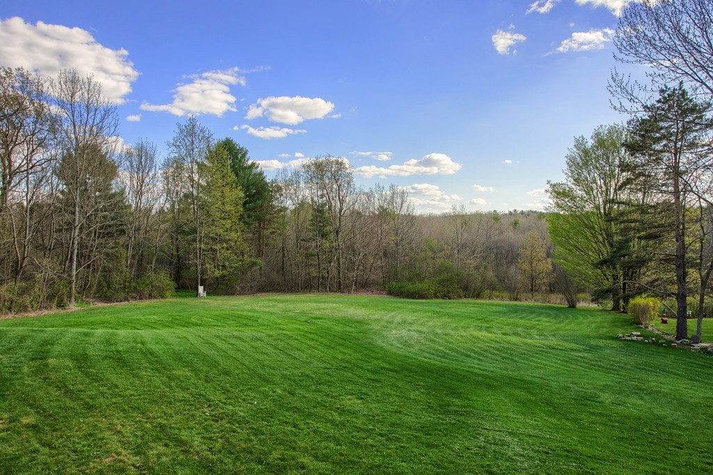 318 Patriots Road Templeton, MA 01468 - Photo 4 of 30 a view of a grassy field