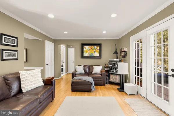 a living room with furniture and a gate