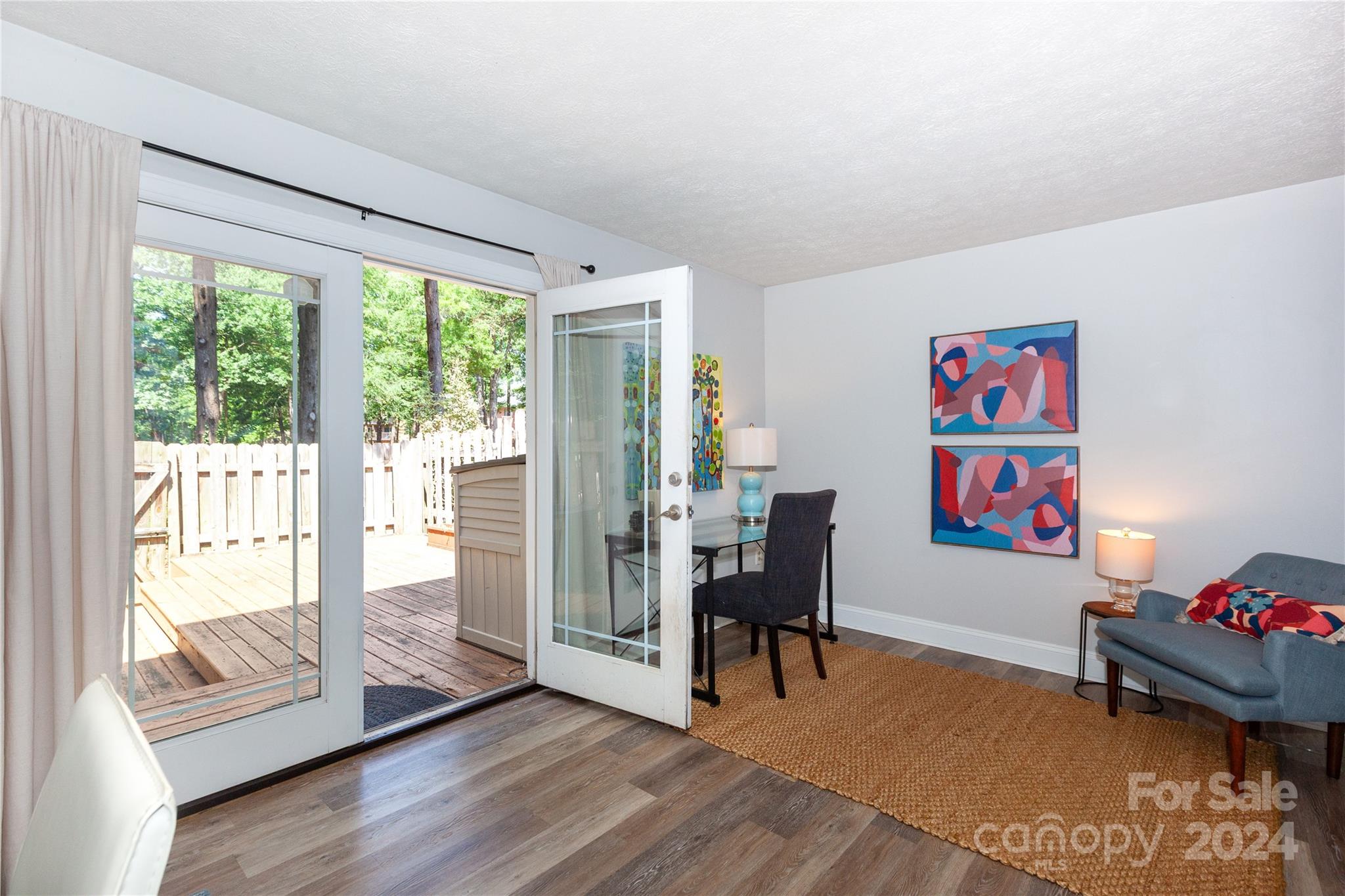 1201 Scaleybark Road, Unit B Charlotte, NC 28209 - Photo 14 of 29 a living room with furniture and a gate