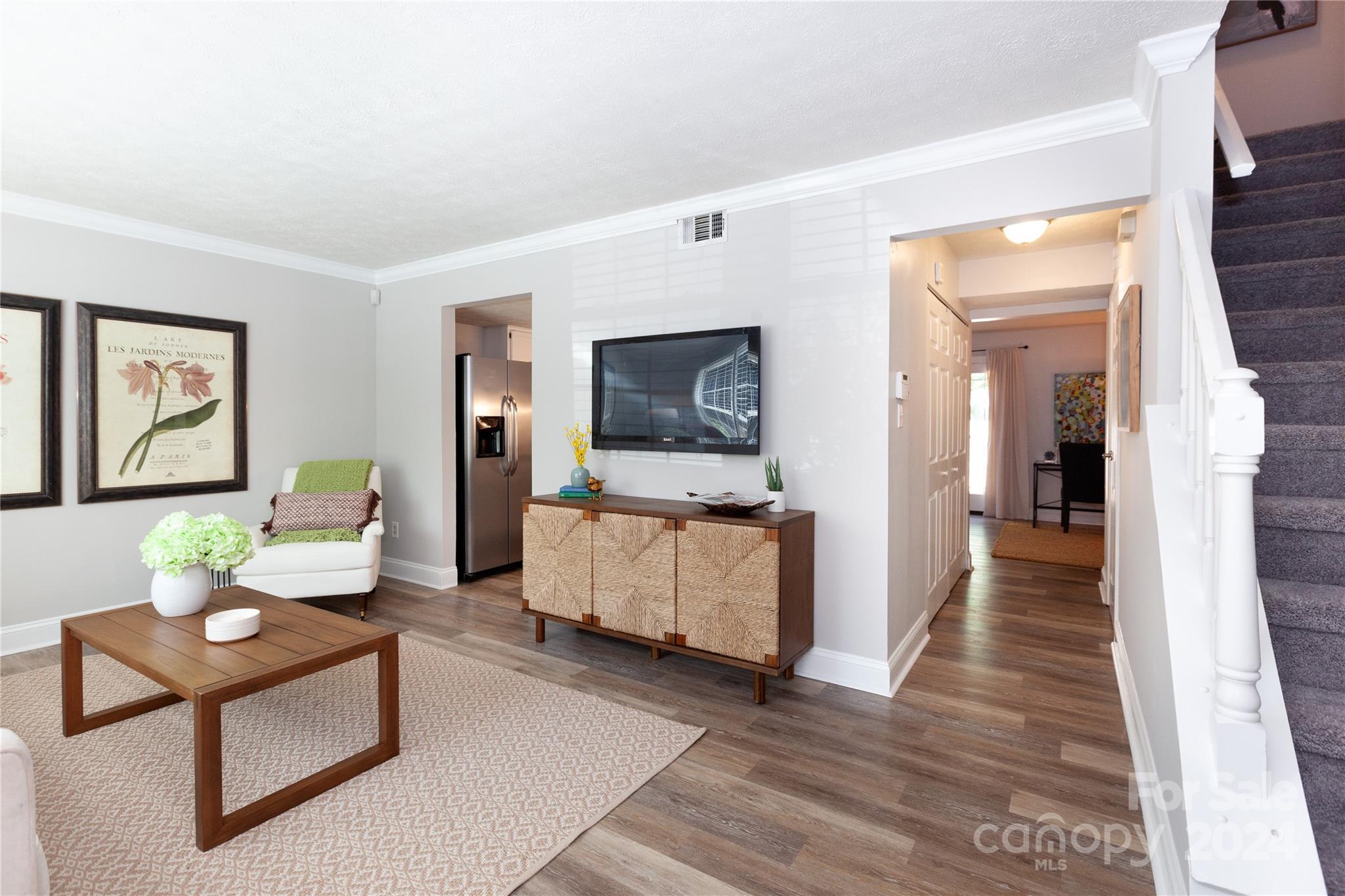 1201 Scaleybark Road, Unit B Charlotte, NC 28209 - Photo 2 of 29 a living room with furniture and wooden floor