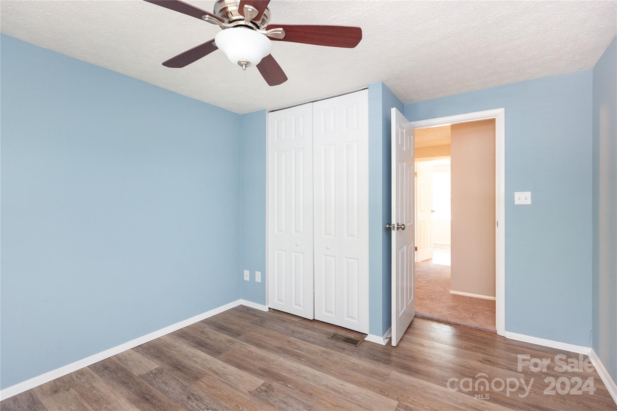 1201 Scaleybark Road, Unit B Charlotte, NC 28209 - Photo 28 of 29 a view of an empty room and wooden floor