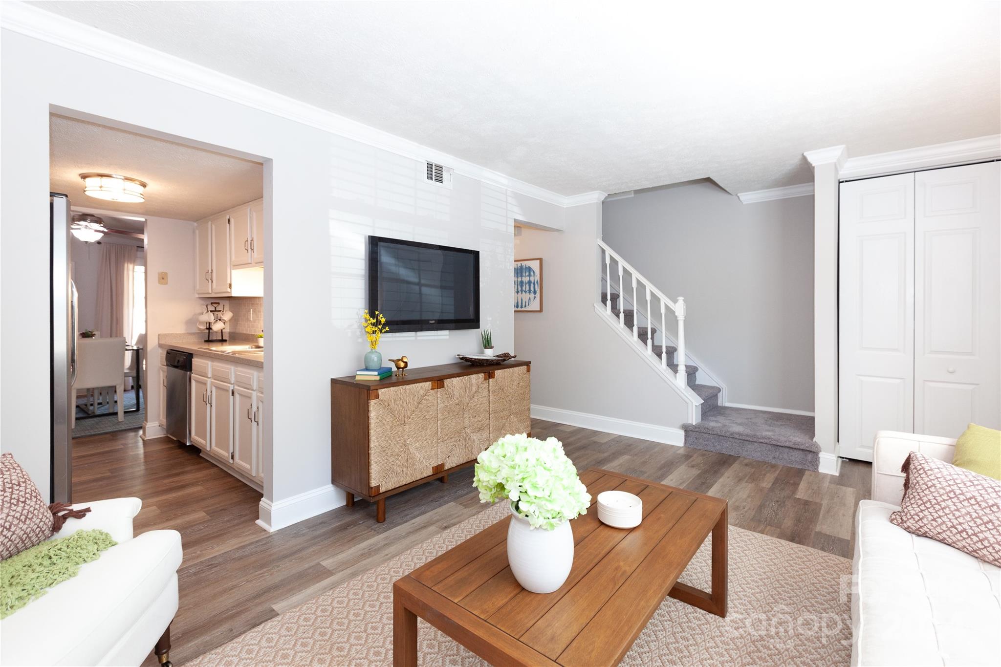 1201 Scaleybark Road, Unit B Charlotte, NC 28209 - Photo 6 of 29 a living room with furniture and a flat screen tv
