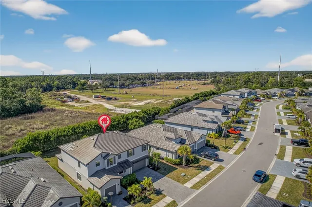 an aerial view of a house with a garden