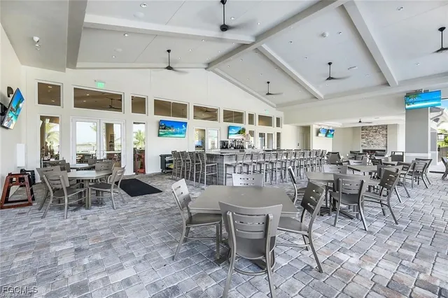 a outdoor space with lots of table and chairs