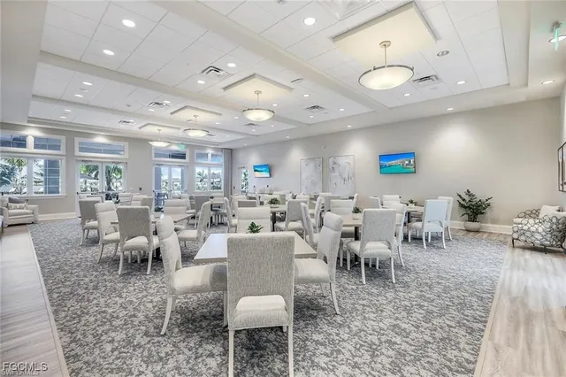 a view of a dining room with furniture