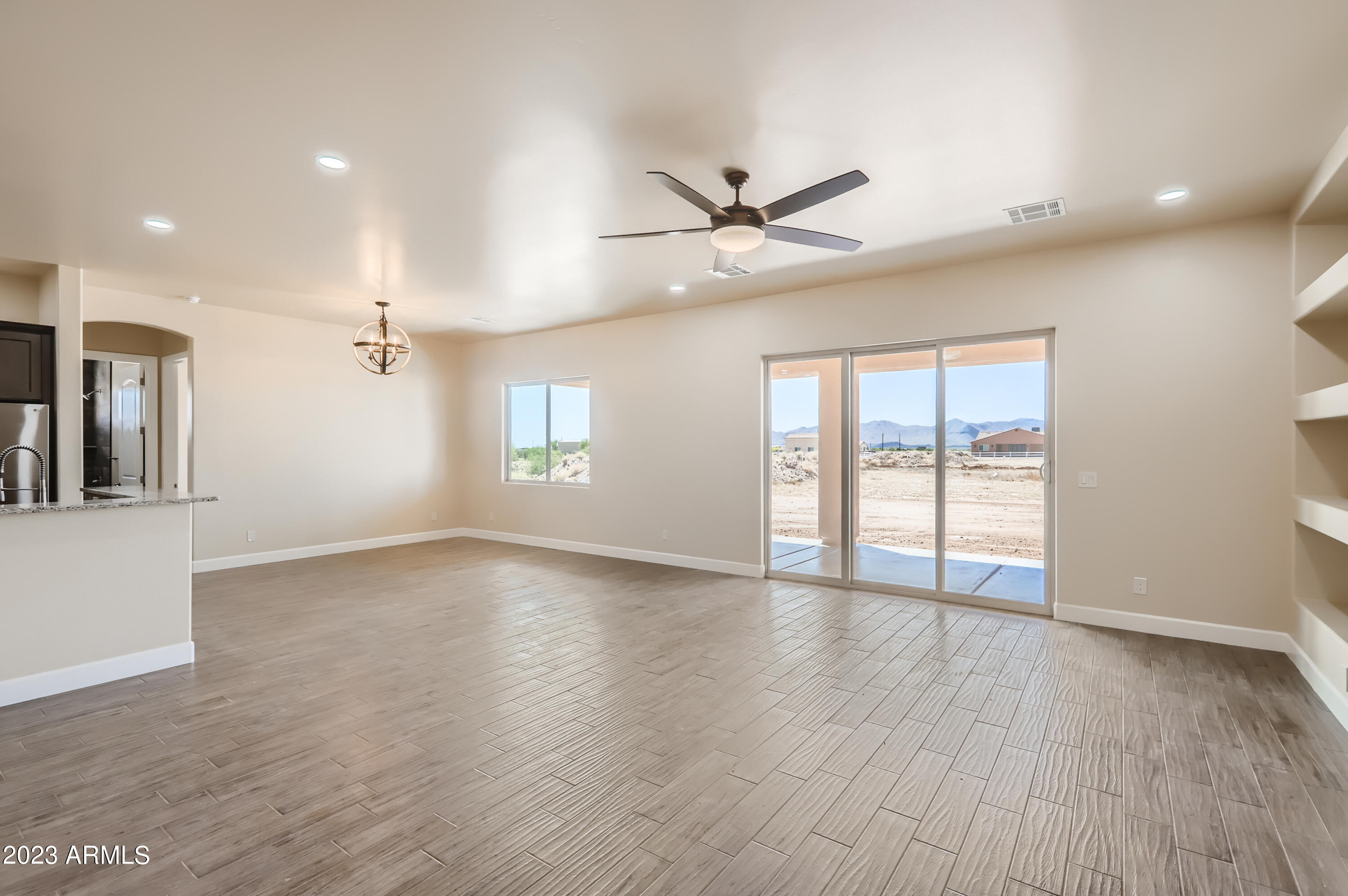 24029 West Redbird Road Wittmann, AZ 85361 - Photo 8 of 26 10 Living Room