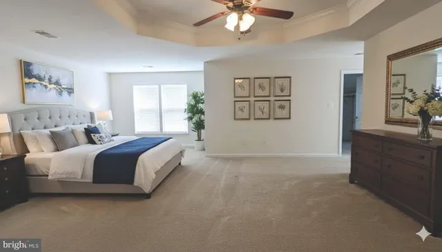 a bathroom with a tub sink shower and mirror