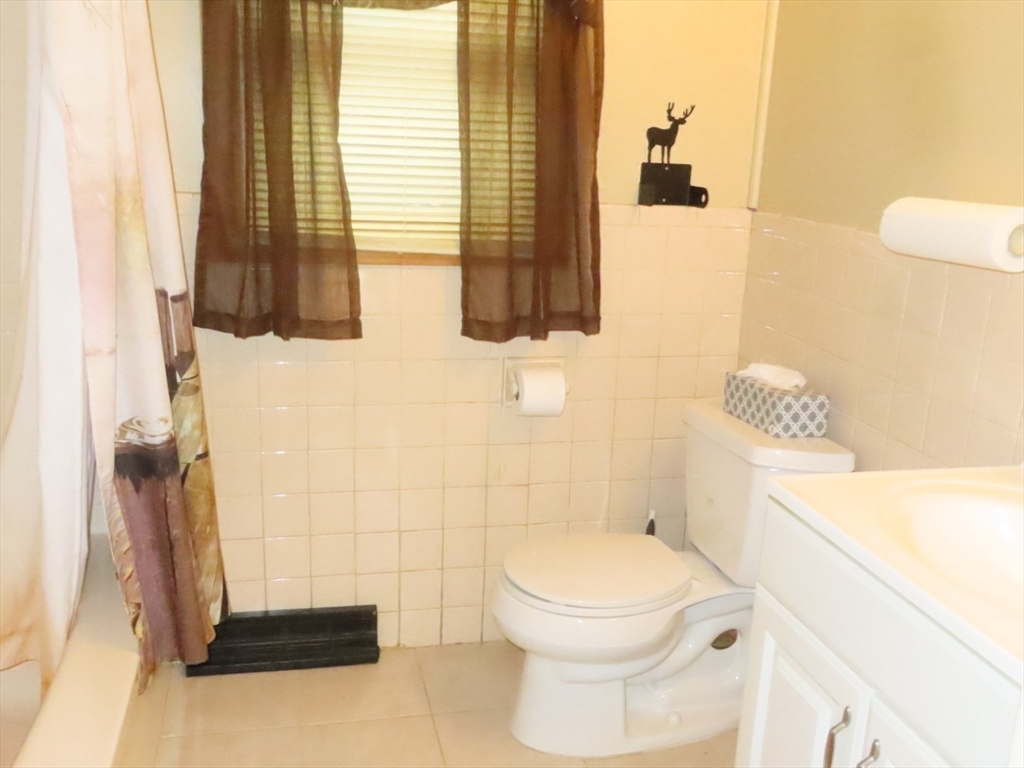 16 Route 130 Sandwich, MA 02644 - Photo 11 of 18 a bathroom with a toilet and a shower