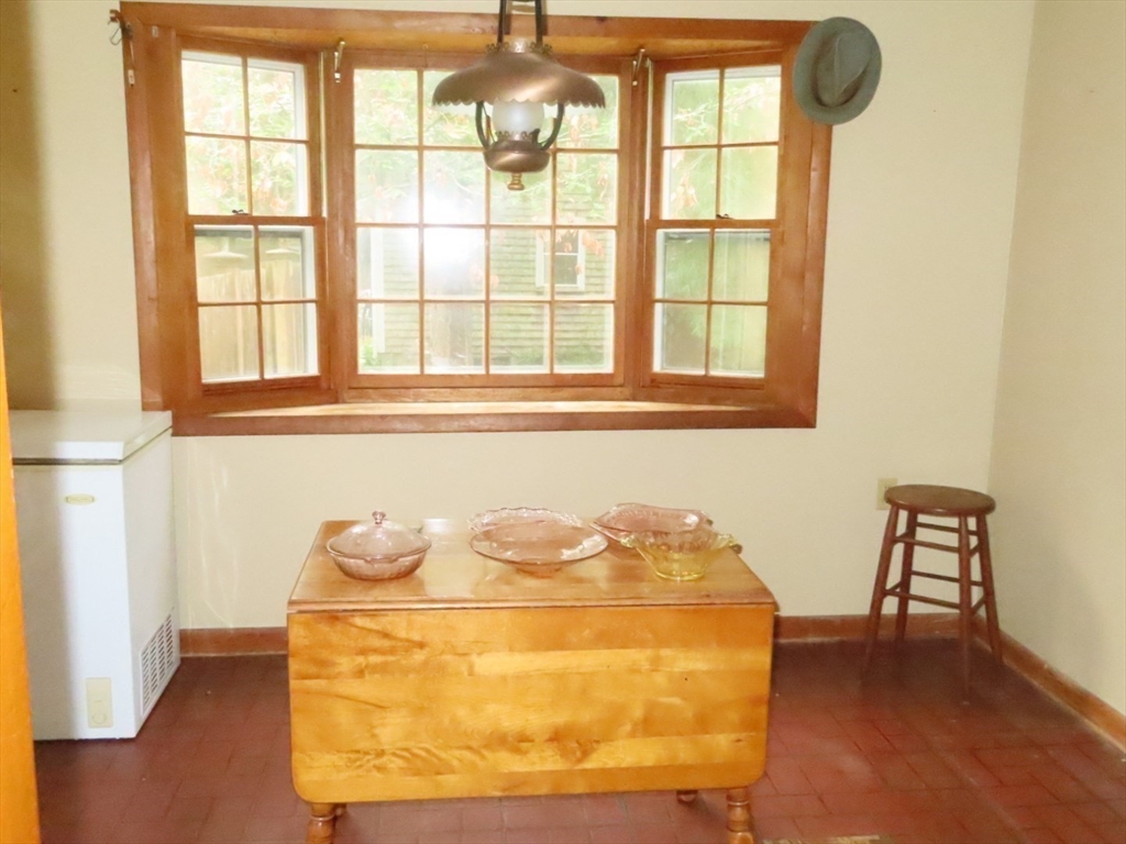 16 Route 130 Sandwich, MA 02644 - Photo 6 of 18 a bathroom with a sink and a window