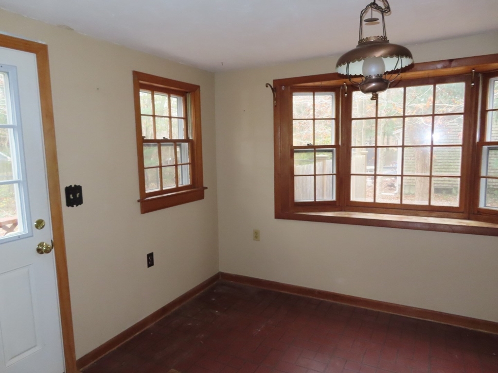 16 Route 130 Sandwich, MA 02644 - Photo 7 of 18 a view of an empty room with a window