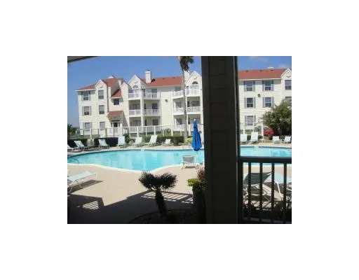 a picture of a bench in front of building