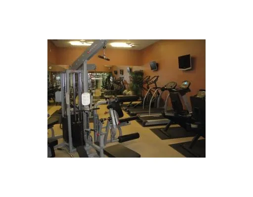 a view of living room with gym equipment
