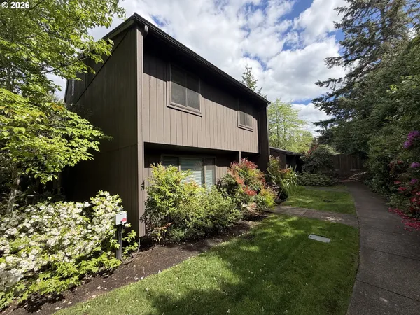 a backyard of a house with lots of green space