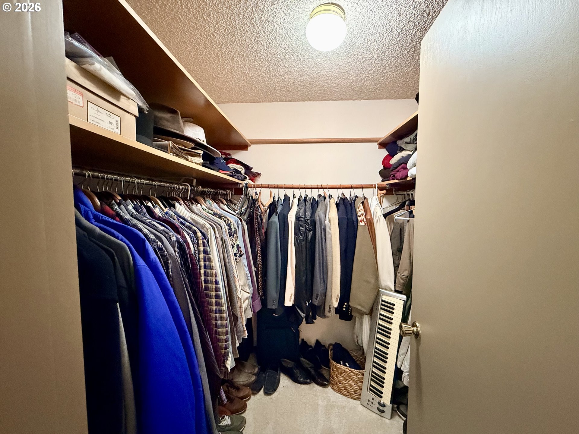 160 Westbrook Way Eugene, OR 97405 - Photo 16 of 31 a view of walk in closet with clothes and shoes