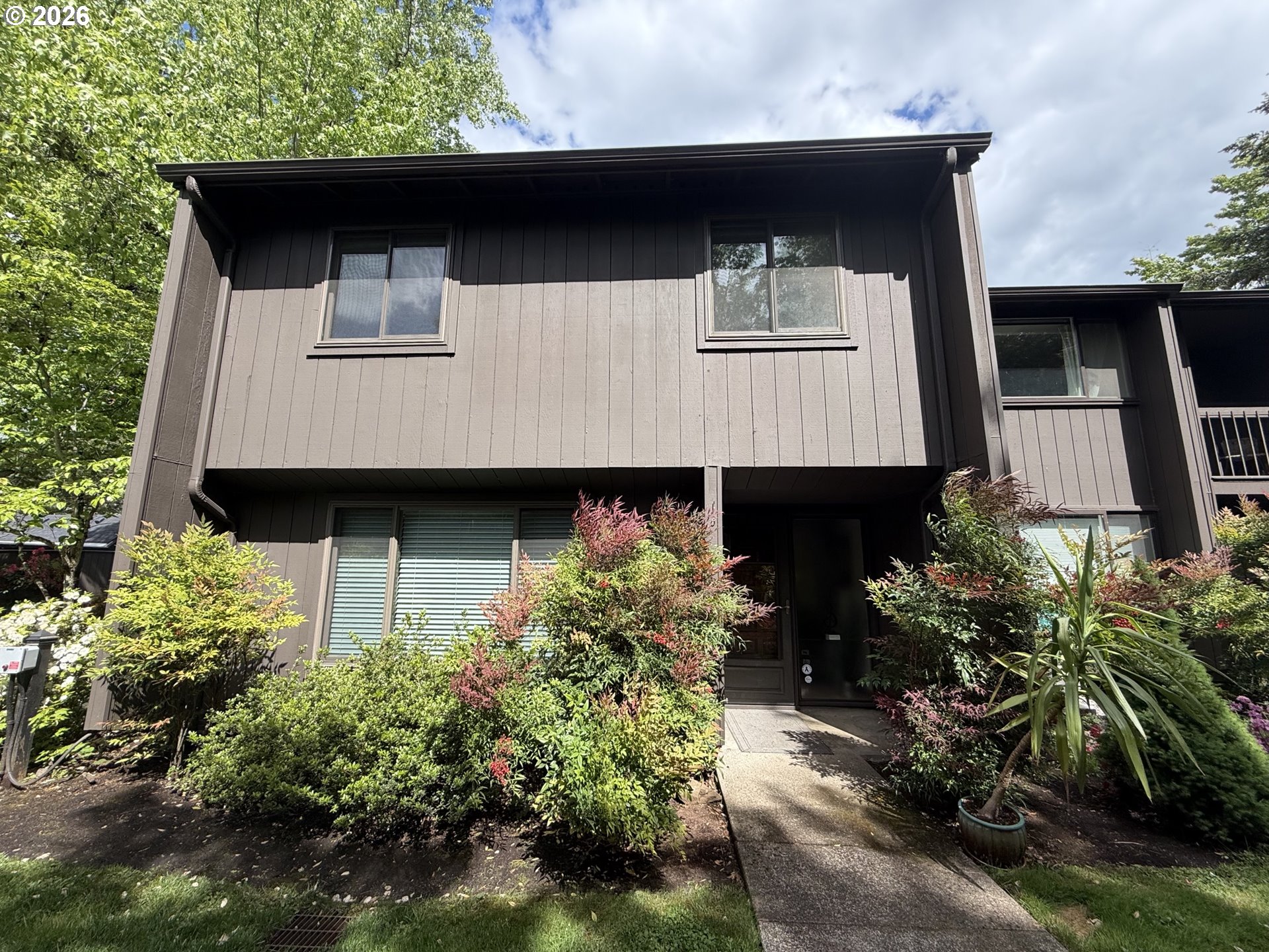 160 Westbrook Way Eugene, OR 97405 - Photo 2 of 31 a house with lots of trees in the background