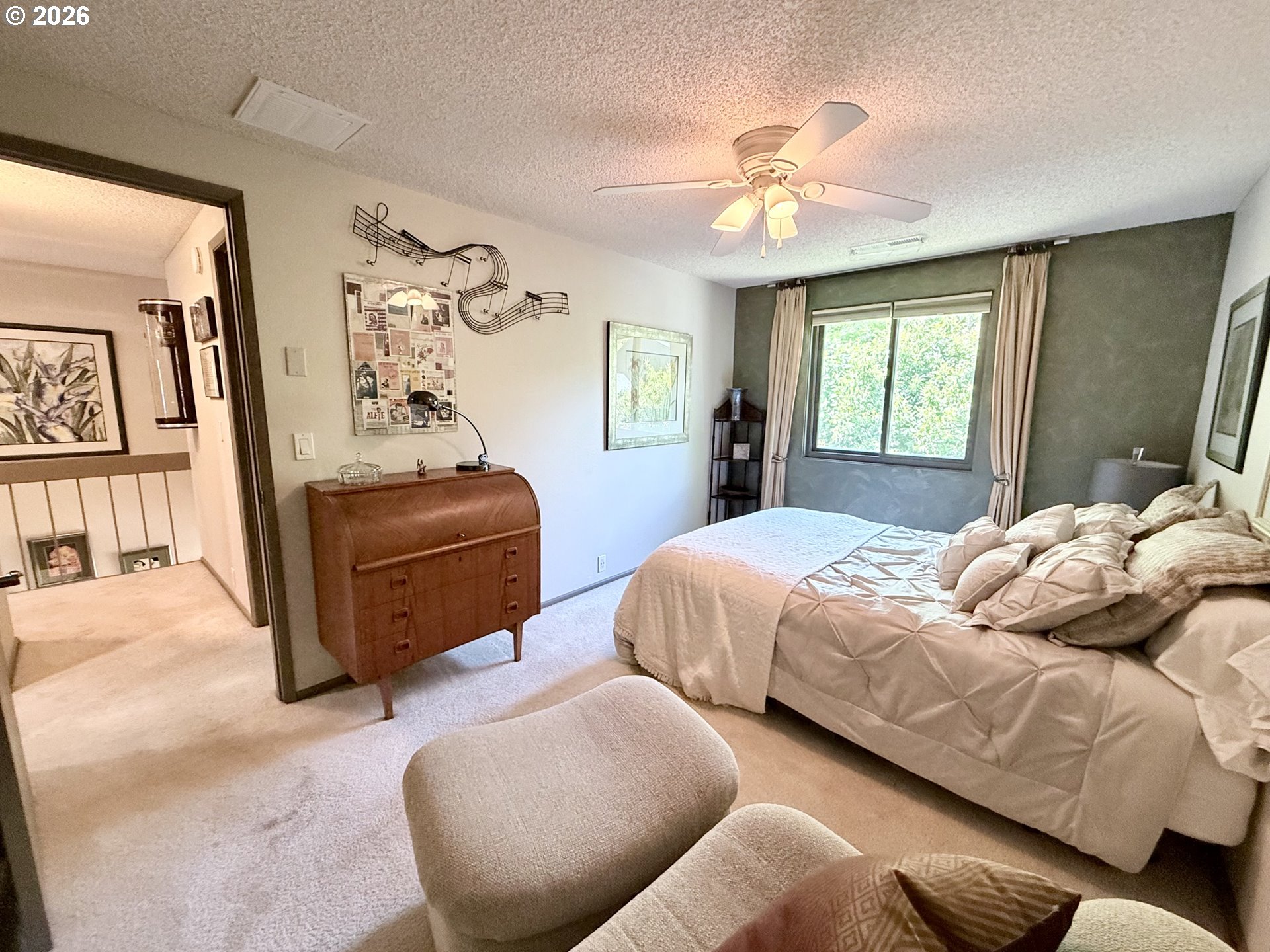 160 Westbrook Way Eugene, OR 97405 - Photo 22 of 31 a bedroom with bed and window