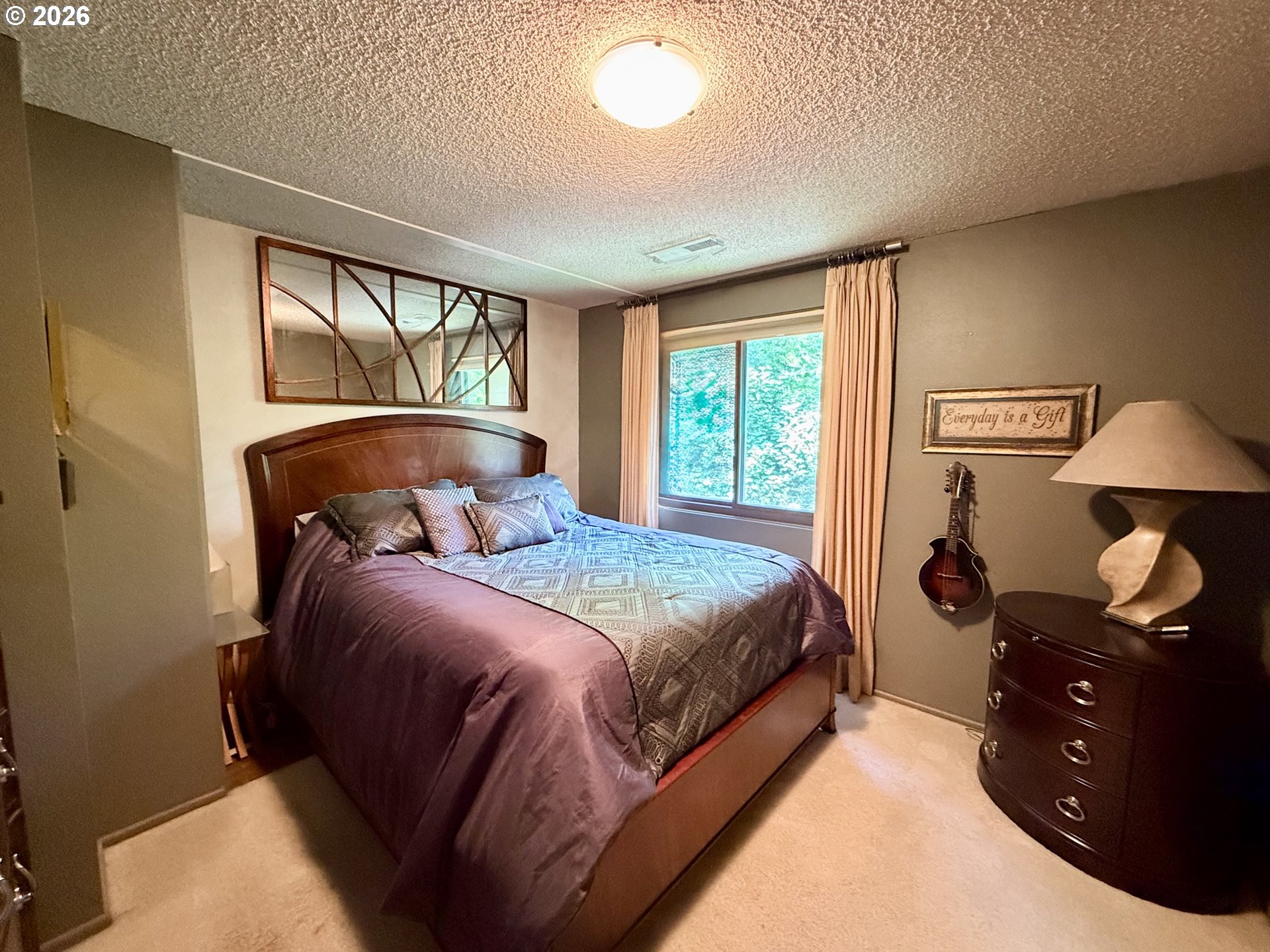 160 Westbrook Way Eugene, OR 97405 - Photo 23 of 31 a bedroom with a bed and a window