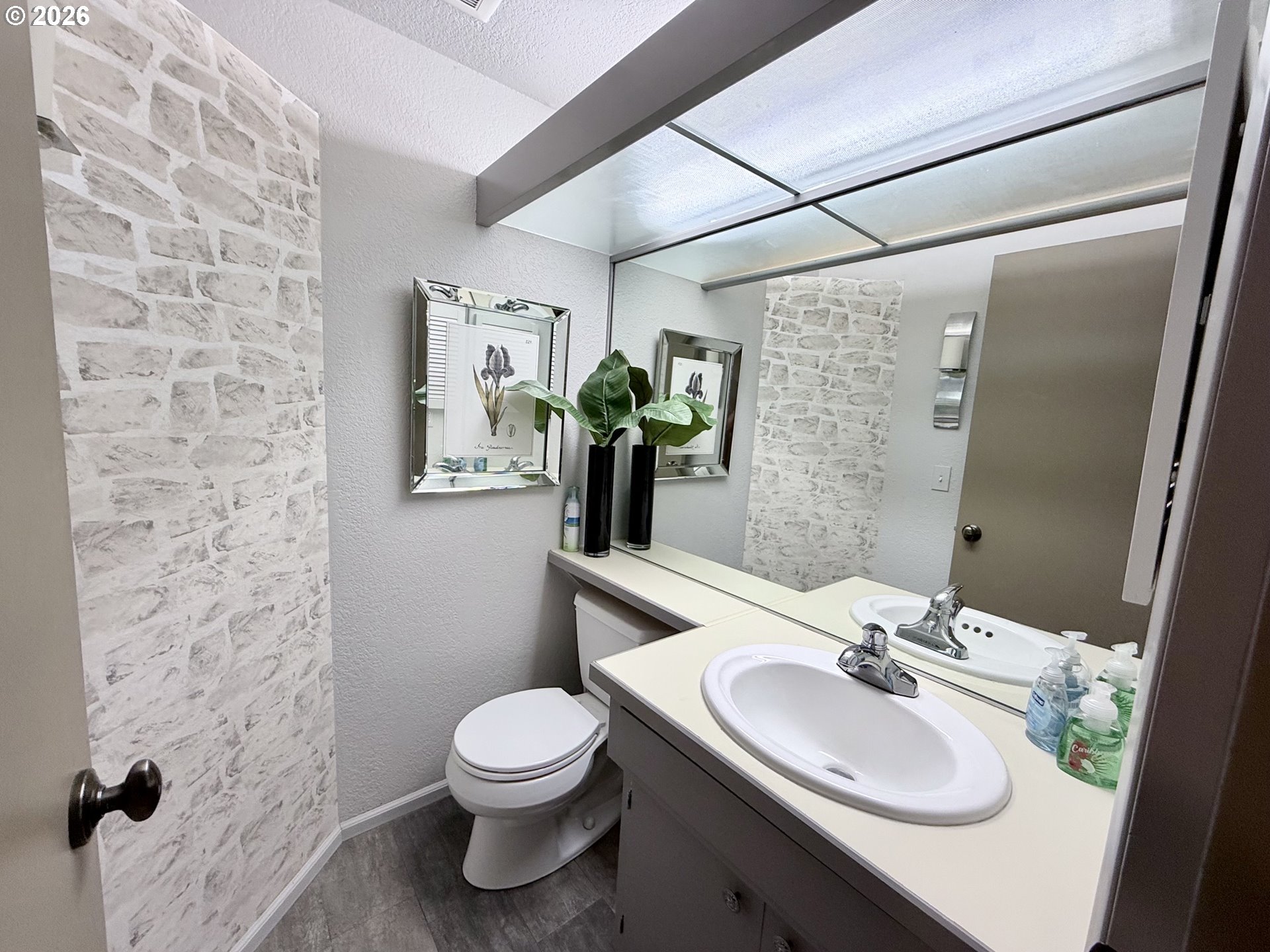 160 Westbrook Way Eugene, OR 97405 - Photo 7 of 31 a bathroom with a sink toilet and shower