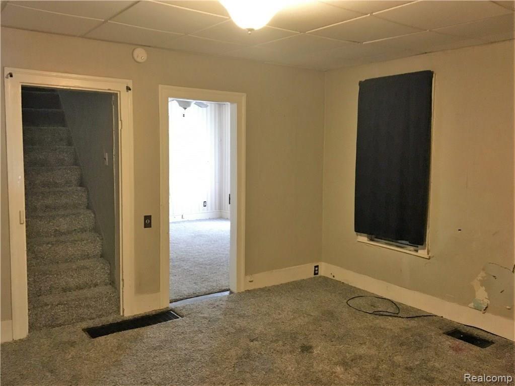 1149 Carleton Rockwood Road Carleton, MI 48117 - Photo 24 of 28 Living Room.jpg