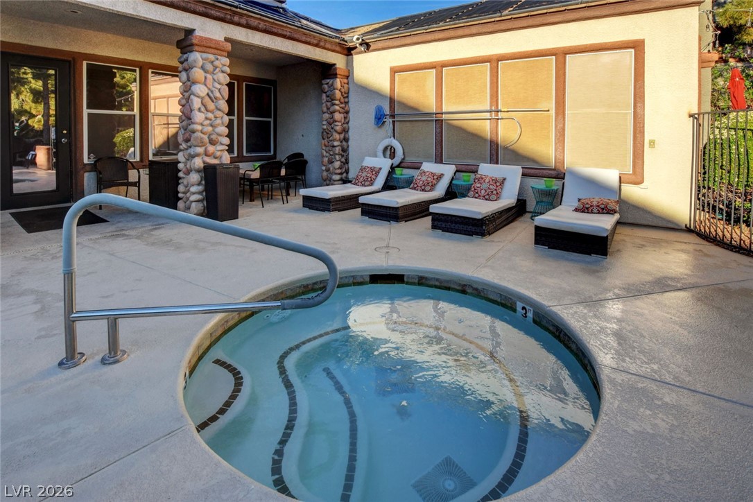 555 East Silverado Ranch Boulevard, Unit 2124 Las Vegas, NV 89183 - Photo 42 of 47 A well-appointed outdoor patio area provides a private spa for relaxation.