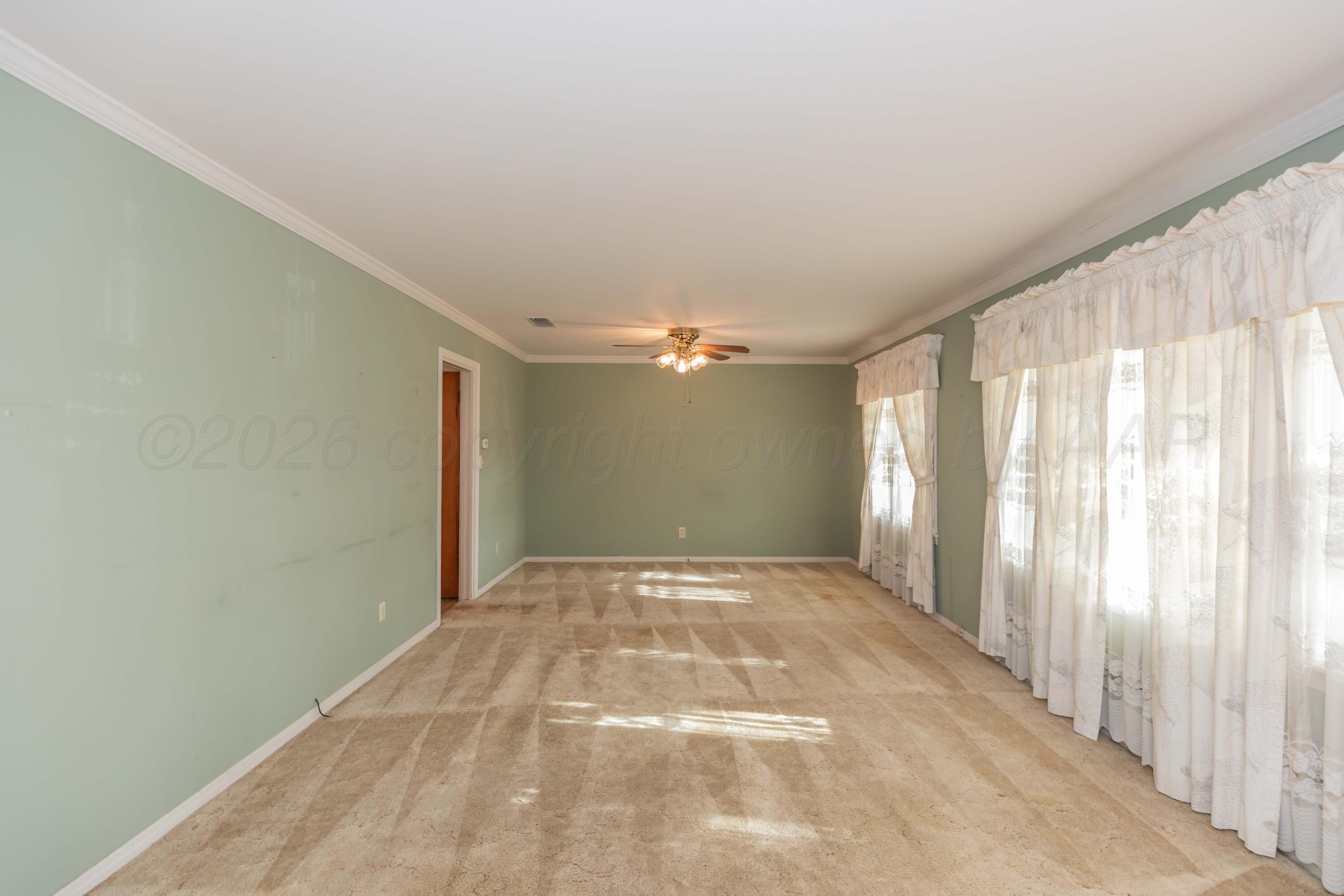 4302 South Travis Street Amarillo, TX 79110 - Photo 8 of 24 LIVING ROOM VIEW 3