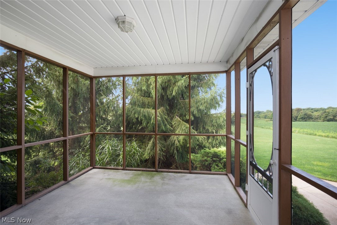 9784 Seacrist Road Beloit, OH 44609 - Photo 4 of 23 Screened in porch to enjoy the outdoors