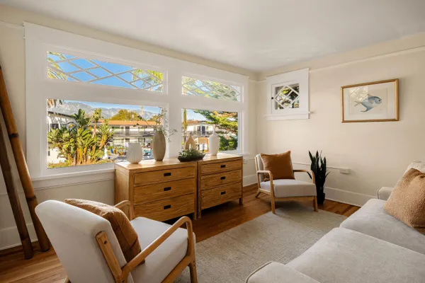 a bed room with furniture and a window