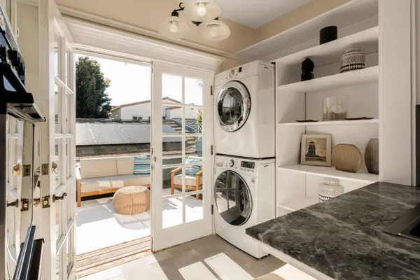 a view of living room washer and dryer