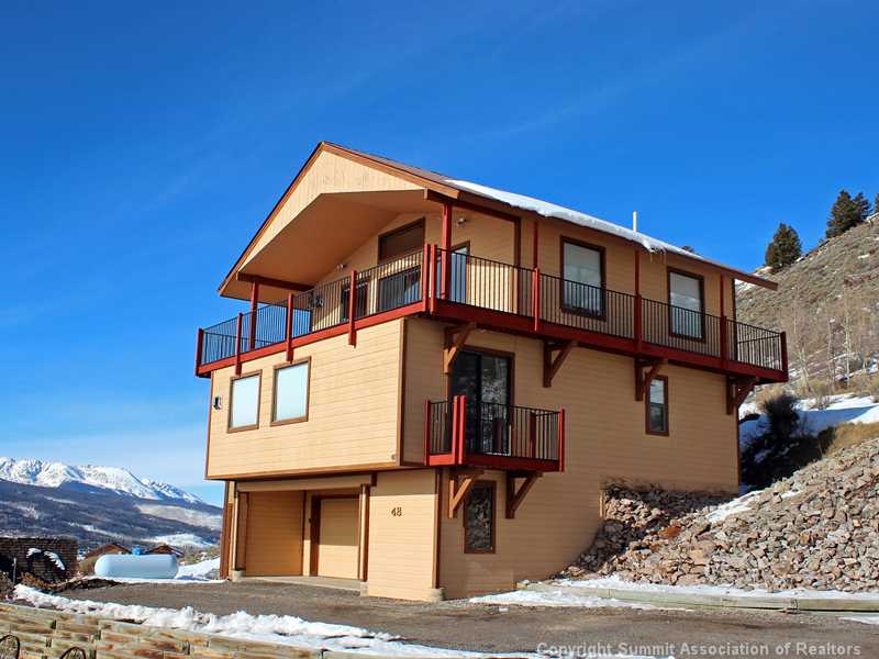 48 AB Road Silverthorne, CO 80498 - Photo 1 of 25 Exterior Front. BEST VIEWS IN SUMMIT COUNTY!!! LOTS OF ROOM FOR GUESTS AND PARTIES AND THERE ISN T A SHORTAGE OF STORAGE.
