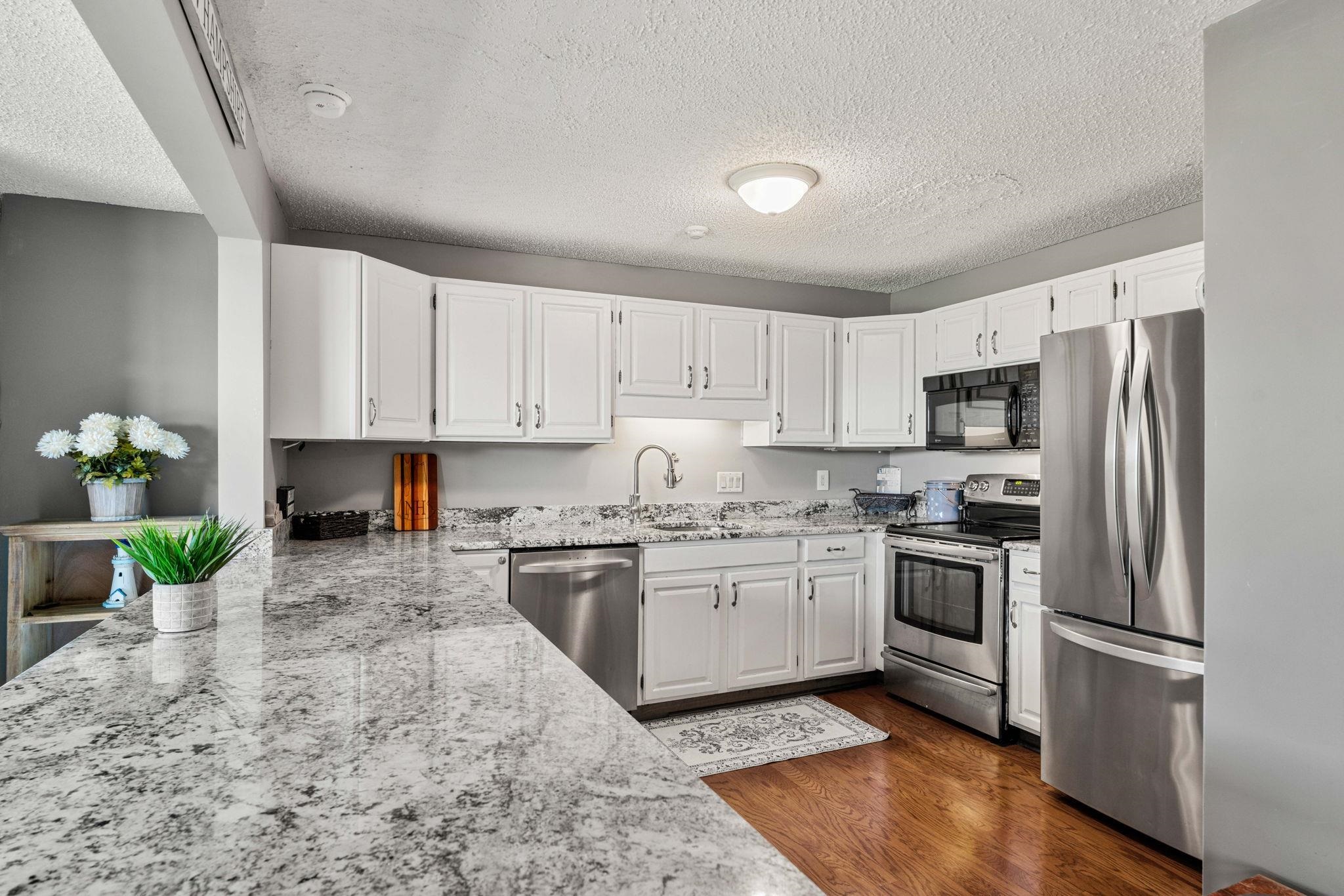 170 Belknap Point Road, Unit 18 Gilford, NH 03249 - Photo 5 of 60