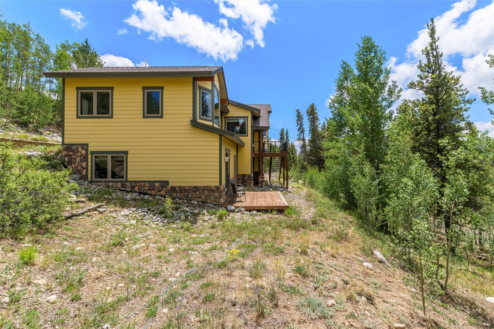 592 Ponderosa Road Fairplay, CO 80440 - Photo 43 of 45 a view of a house with a yard