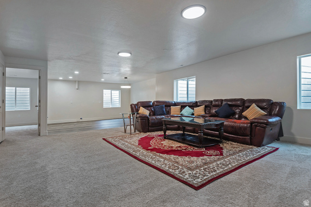 11694 Engelmann Drive Draper, UT 84020 - Photo 36 of 41 Carpeted living area featuring baseboards