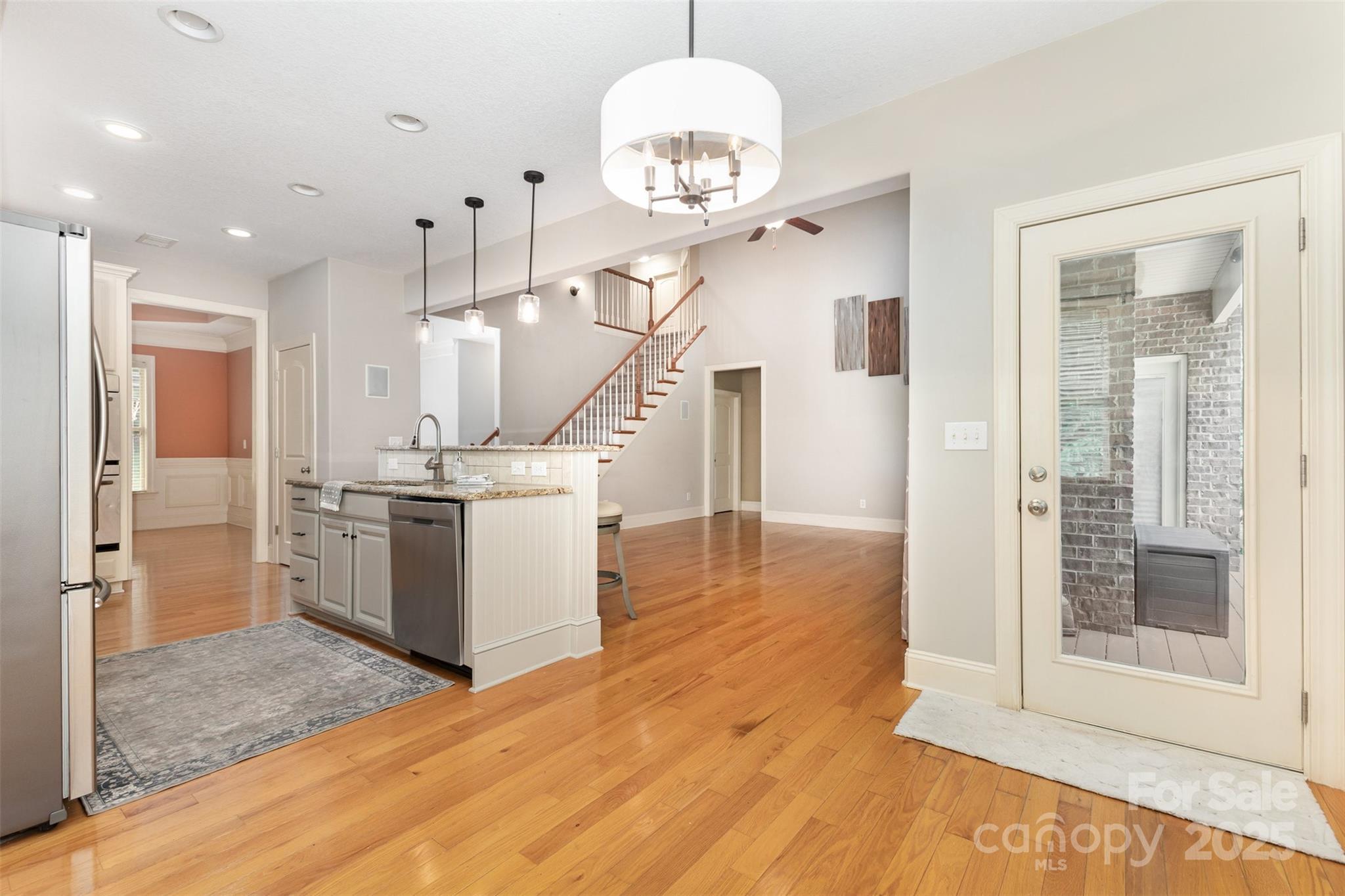 689 Presbyterian Road Mooresville, NC 28115 - Photo 11 of 34 a view of a hallway with wooden floor and entryway