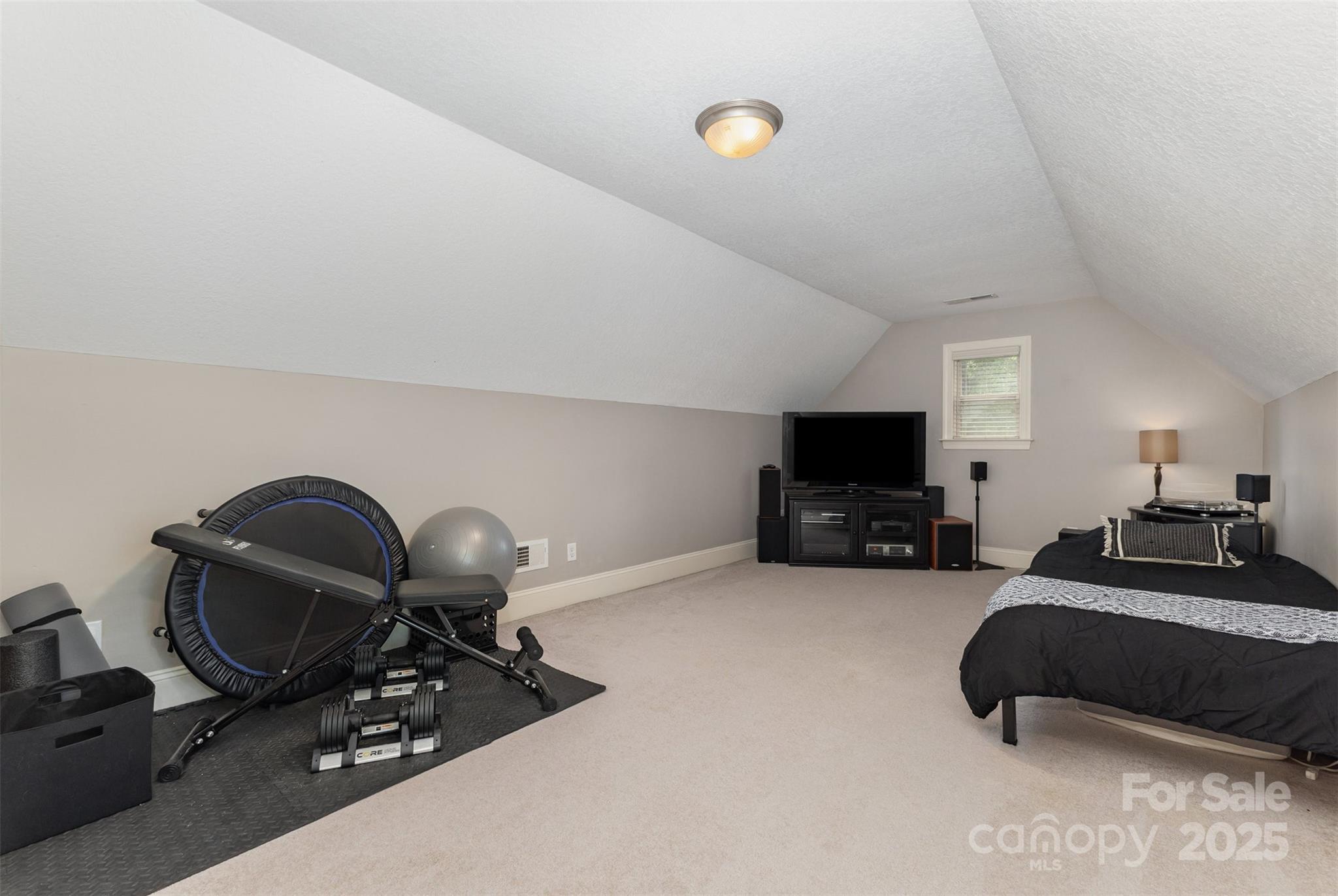689 Presbyterian Road Mooresville, NC 28115 - Photo 27 of 34 a living room with furniture and a flat screen tv