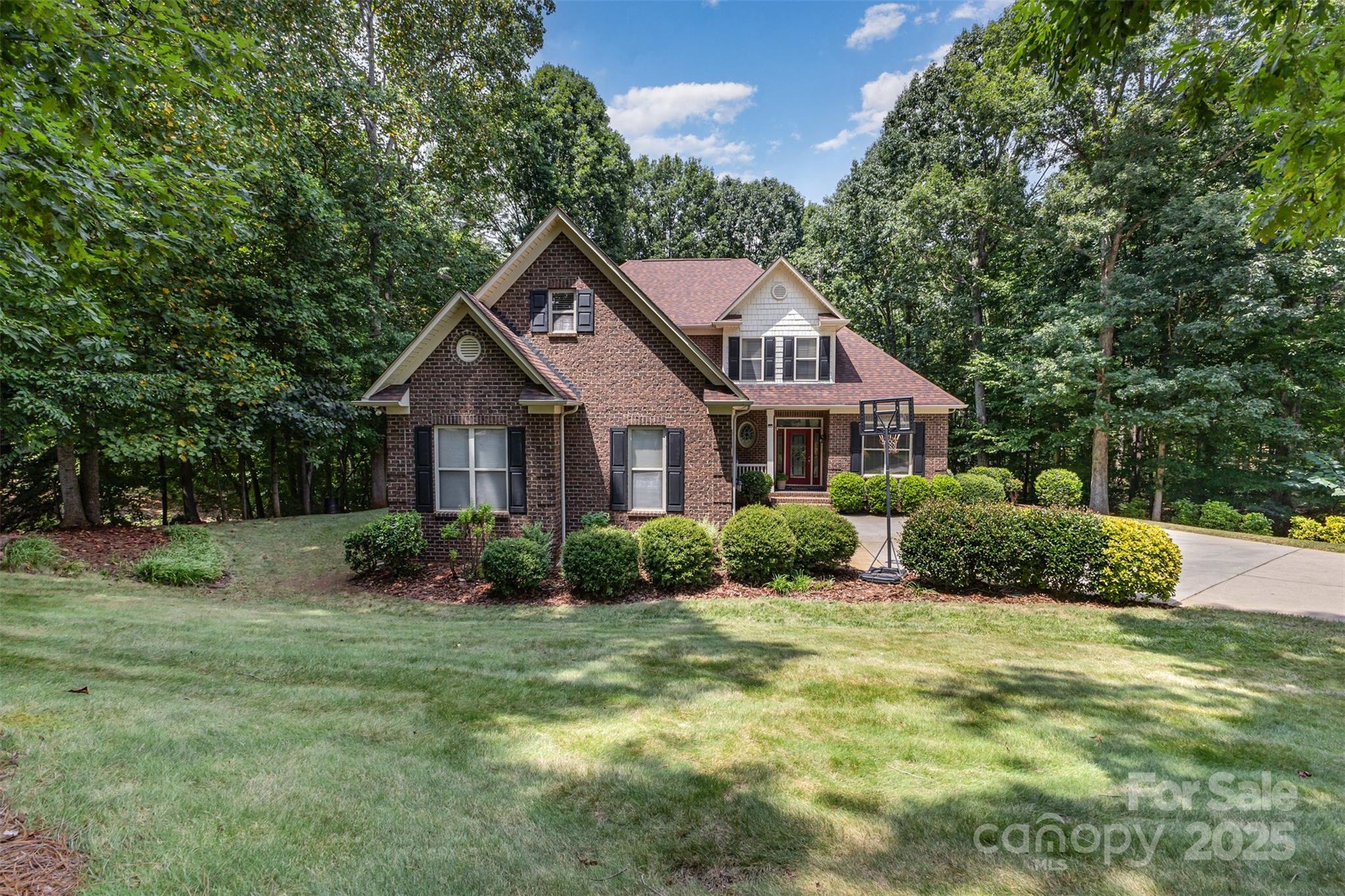 689 Presbyterian Road Mooresville, NC 28115 - Photo 3 of 34 a front view of a house with a yard