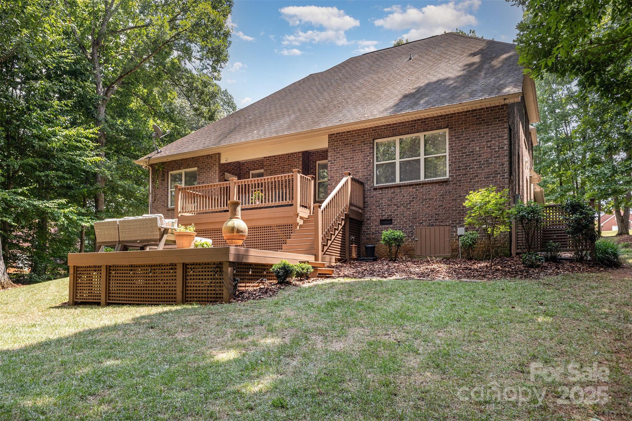 689 Presbyterian Road Mooresville, NC 28115 - Photo 31 of 34 a view of a house with backyard and sitting area