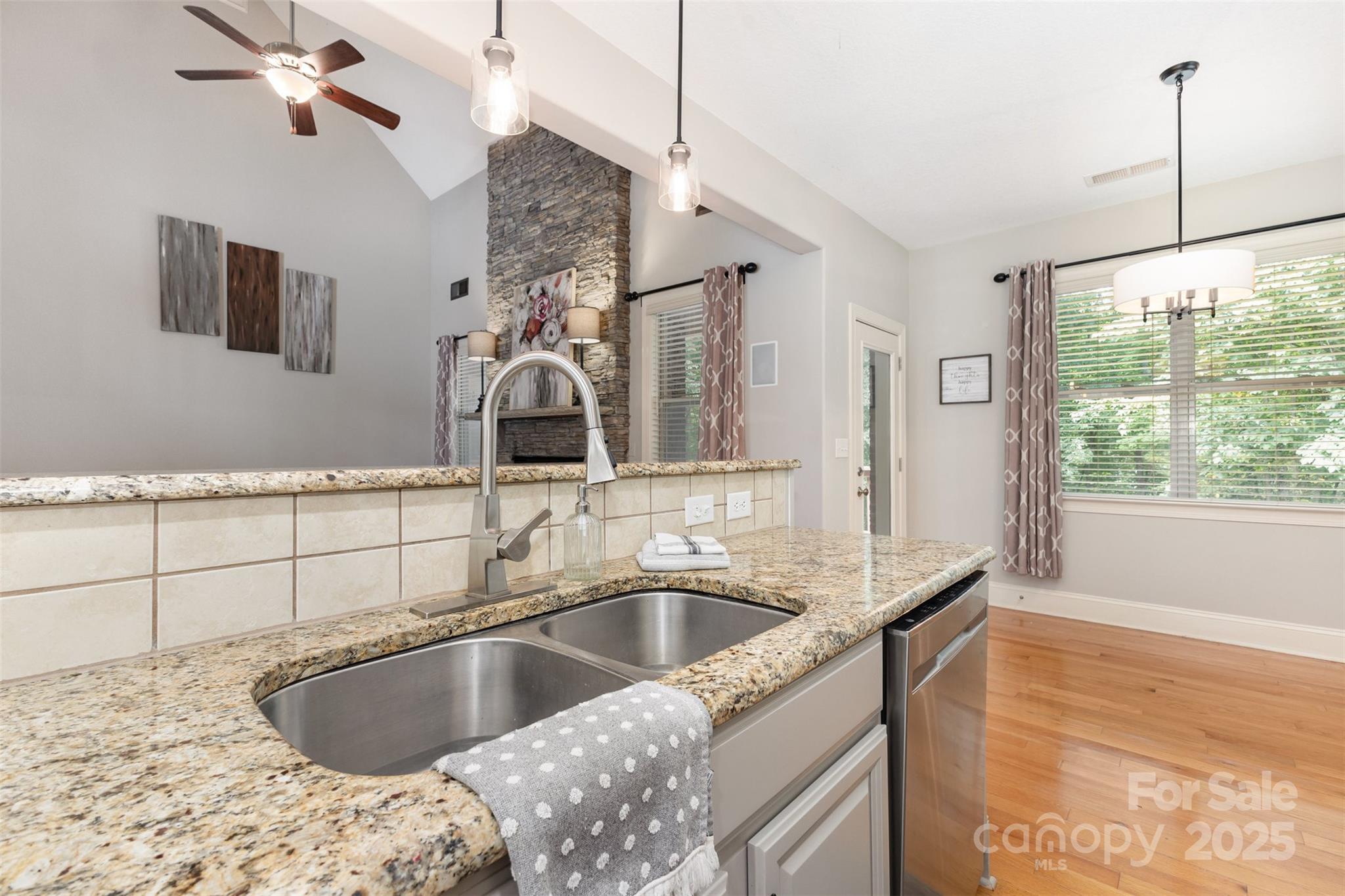 689 Presbyterian Road Mooresville, NC 28115 - Photo 8 of 34 a kitchen with a sink and a window