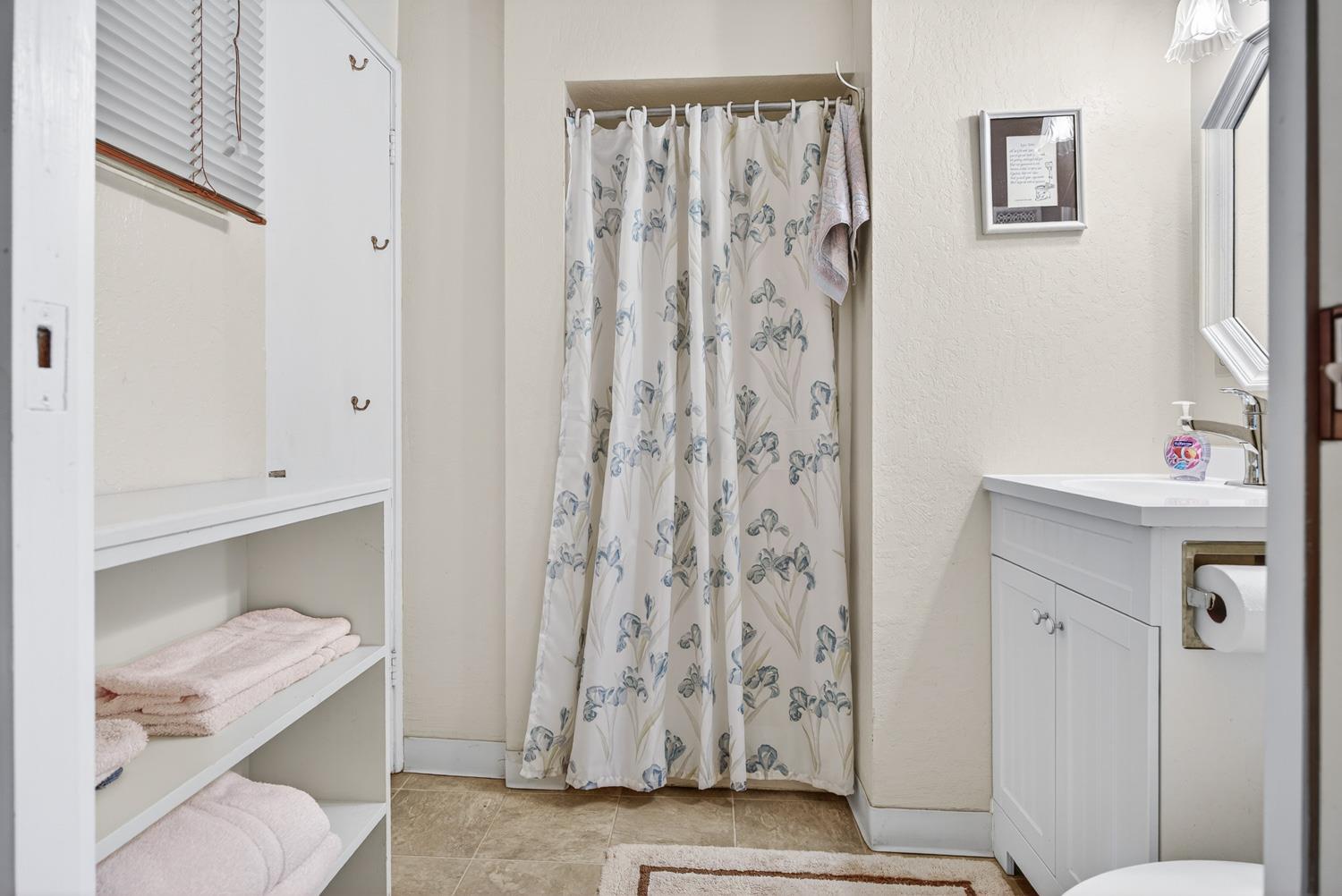 1224 Moran Road Arnold, CA 95223 - Photo 38 of 61 a bathroom with a sink and a mirror