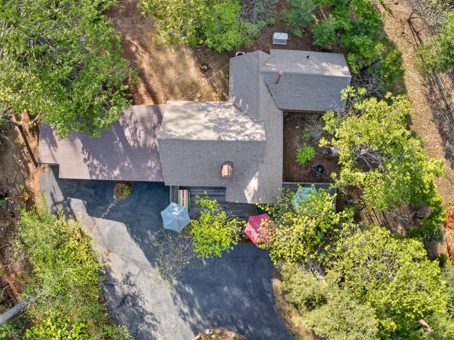 1224 Moran Road Arnold, CA 95223 - Photo 49 of 61 an aerial view of a house with a yard and a garden